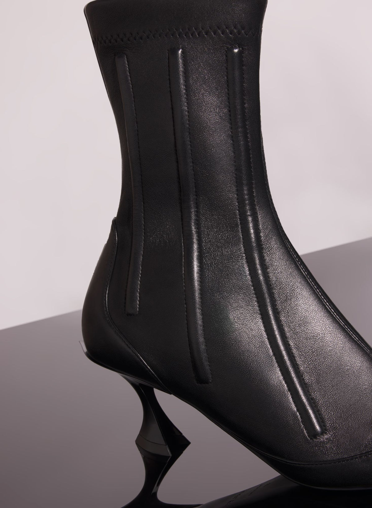 RED BONED LEATHER FANG 55 ANKLE BOOTS
