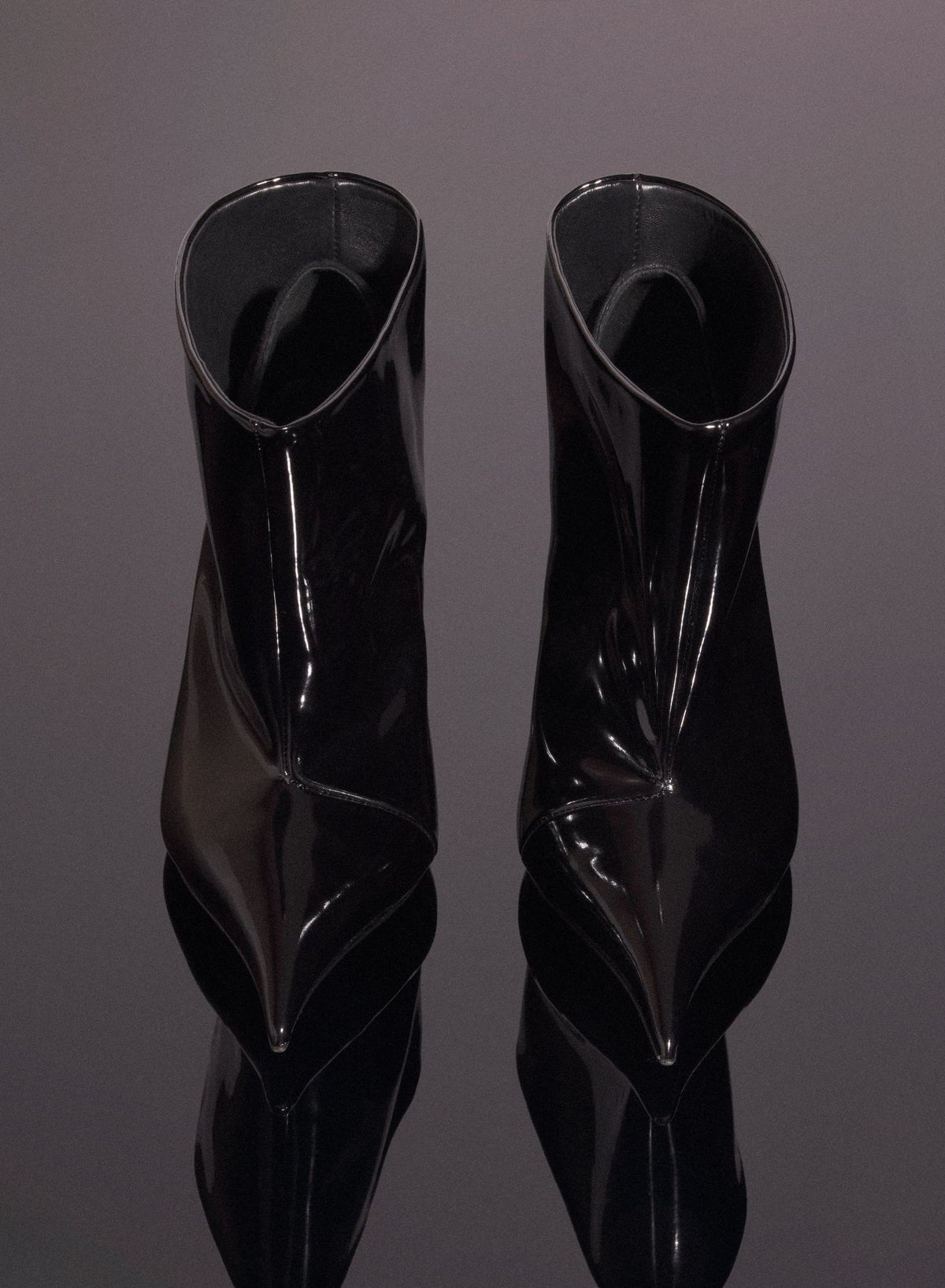 BLACK SHINY LEATHER PIERCING FANG 95 ANKLE BOOTS