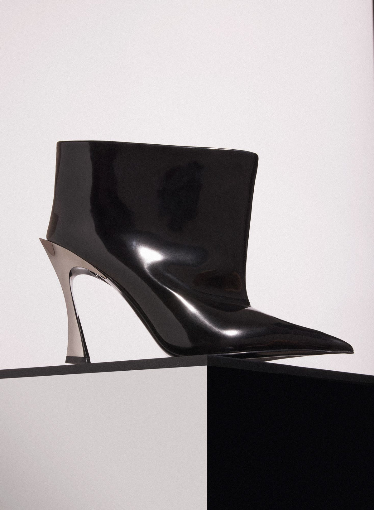 BLACK SHINY LEATHER PIERCING FANG 95 ANKLE BOOTS