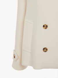 OK PORTE_Manteau court croisé en laine - Eden White