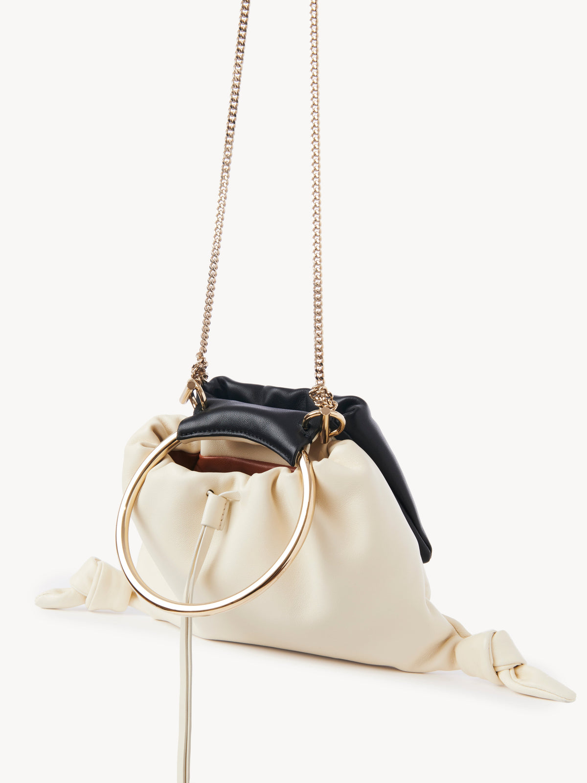 OK PORTE_Sac Clutches Arlene en cuir - White & Black