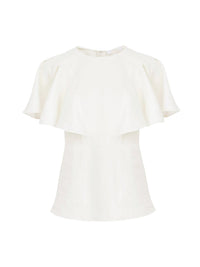 OK PORTE_Blouse volantée sans manches en lin - Iconic Milk